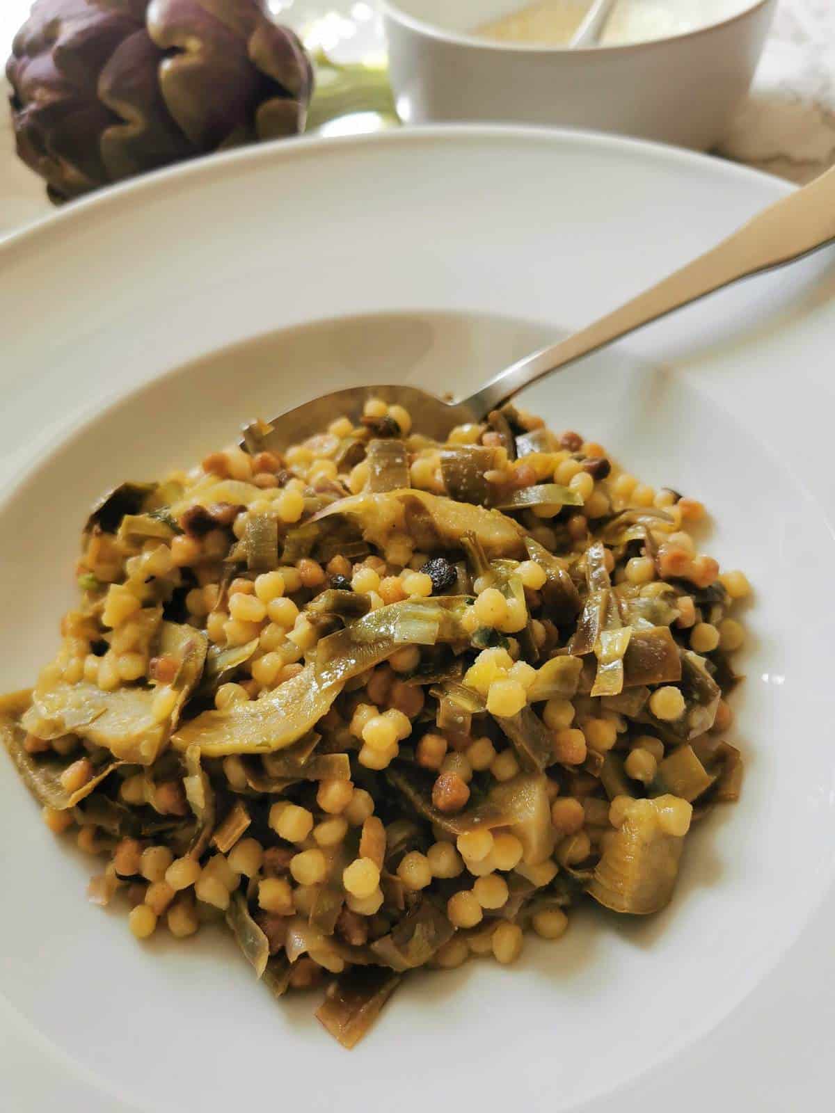 Sardinian fregola pasta with artichokes.