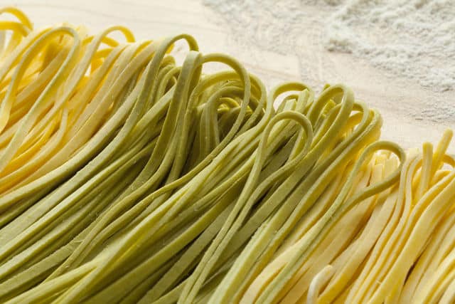 fresh green and white tagliolini