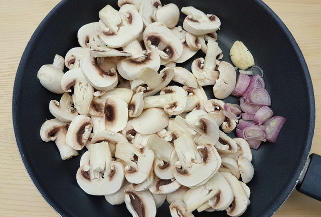 mushrooms, shallot and garlic in frying pan