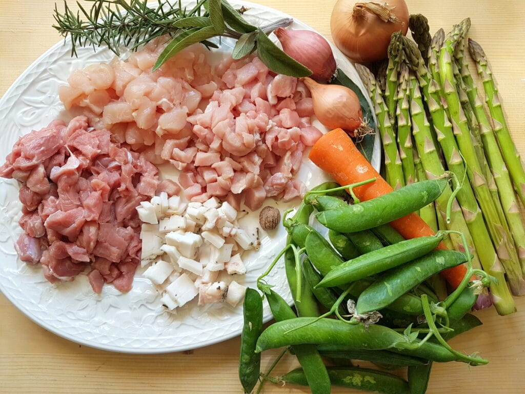 ingredients for gargati with spring ragu a mixed meat ragu with asparagus and peas 