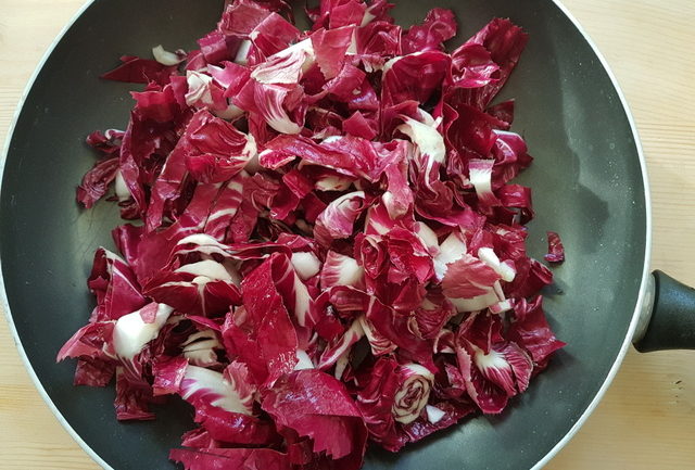 chopped radicchio in frying pan