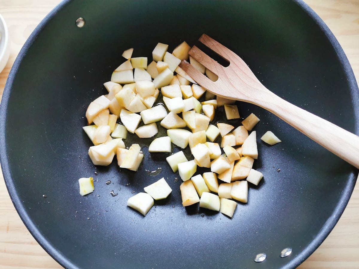 Pear cubes in deep frying pan with a little olive oil.