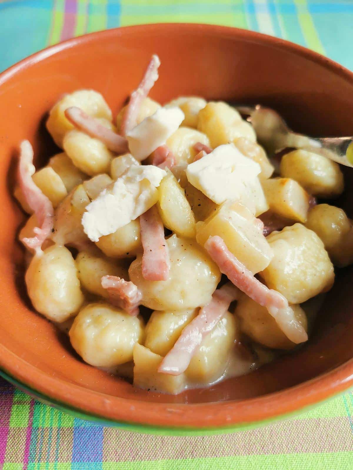 Gnocchi with taleggio, pears and speck.