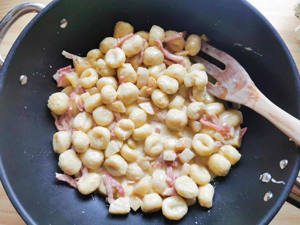 Gnocchi with taleggio, pears and speck ready to serve.