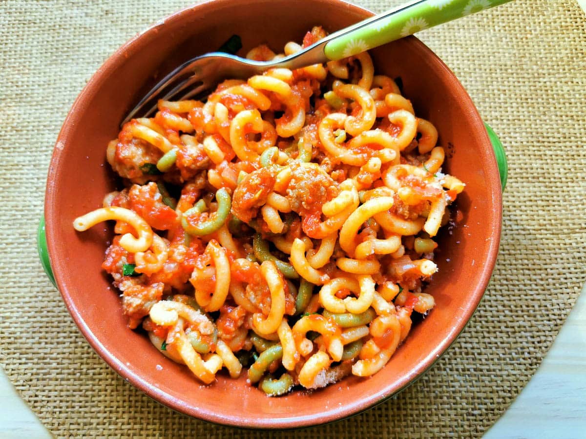 gramigna with sausage in a bowl