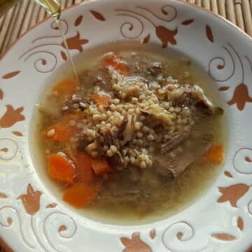 Homemade beef broth with whole-wheat grattoni pasta.