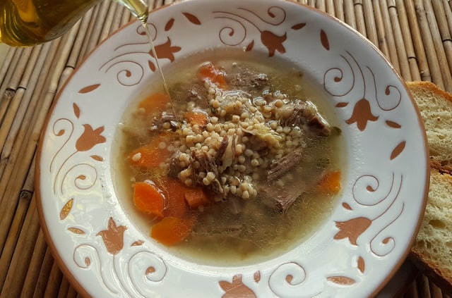 Homemade beef broth with whole-wheat grattoni pasta.