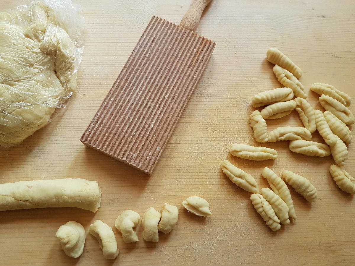 Cavatelli pasta dough being shaped.