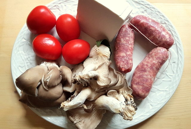 ingredients for homemade cavatelli pasta with oyster mushrooms and sausage 