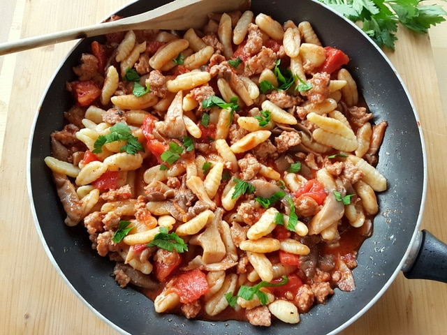 homemade cavatelli with pyster mushrooms and sausage.