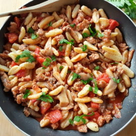 homemade cavatelli pasta with oyster mushrooms and sausage