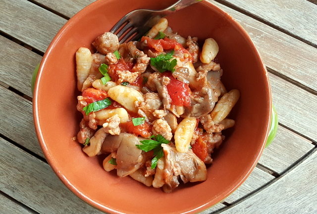 homemade cavatelli pasta with oyster mushrooms and sausage 