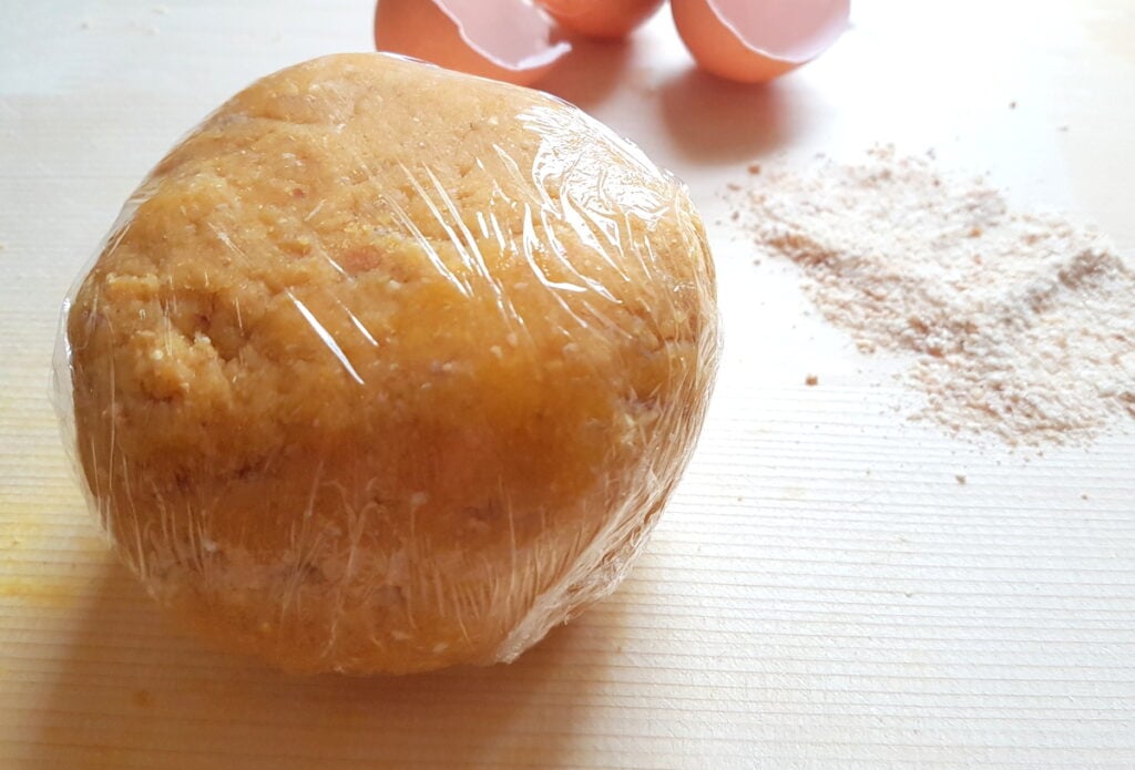 ready passatelli dough covered in cling film.