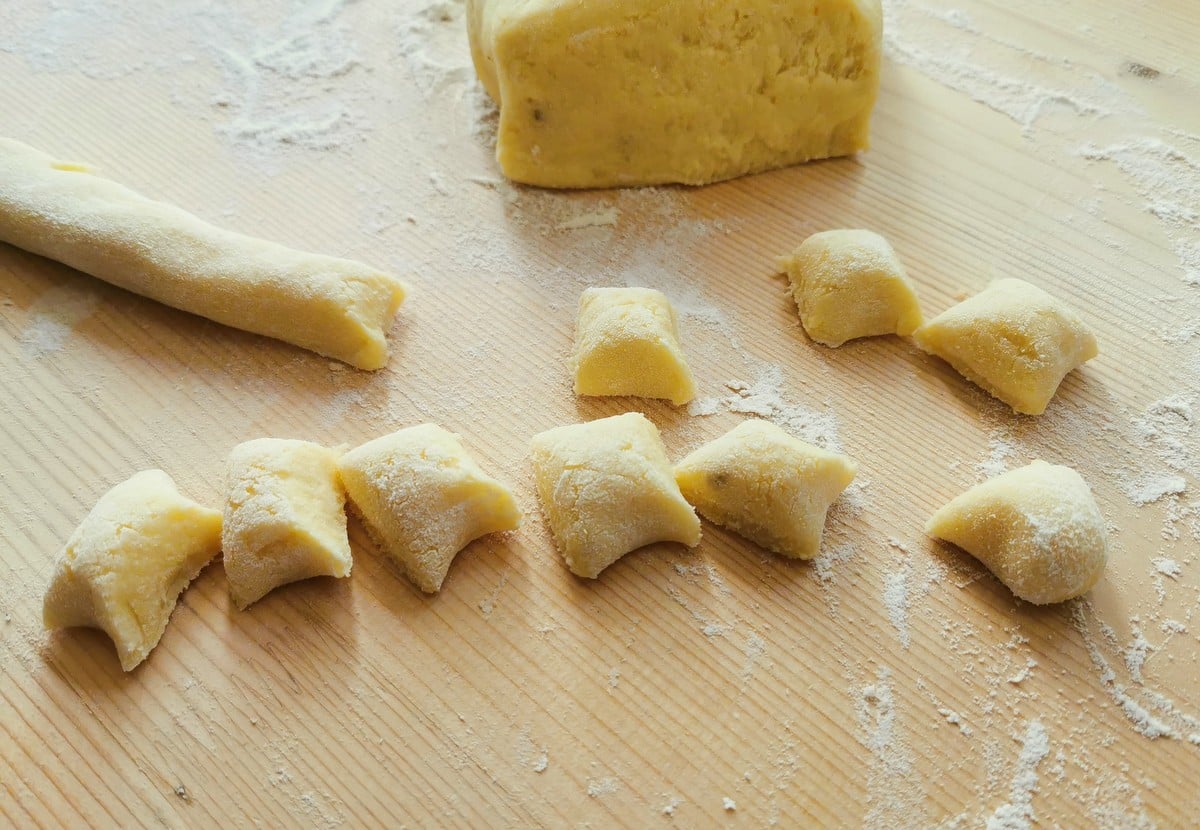 gnocchi dough cut into a rope and also some ready cut gnocchi
