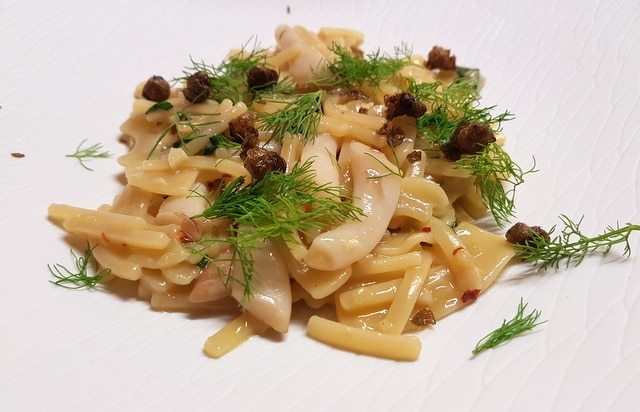 Mischiato Delicato oil and garlic with toasted capers, squid, fennel and chili pepper (chef Steven)