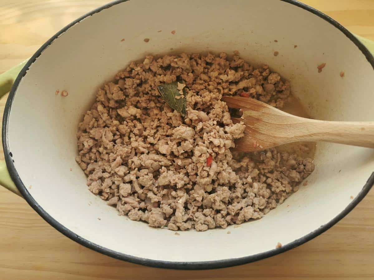 Browned lamb meat in a pot.