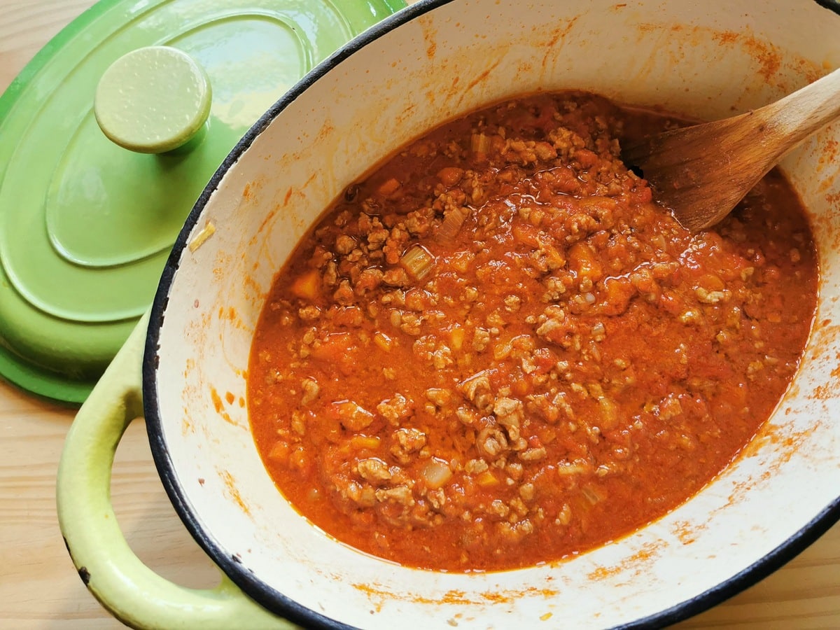 Lamb ragu that has been simmered in a pot.