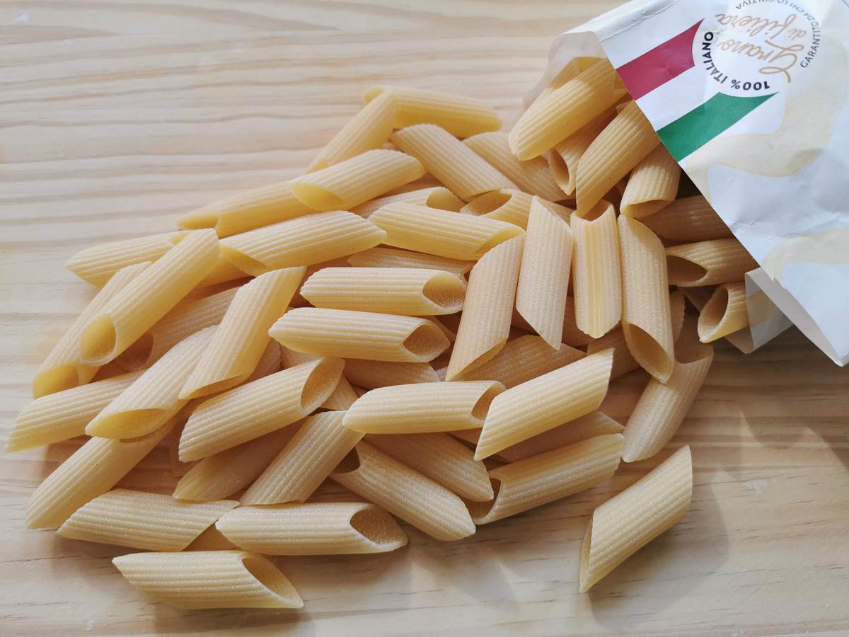 Dried large ridged pennoni pasta.