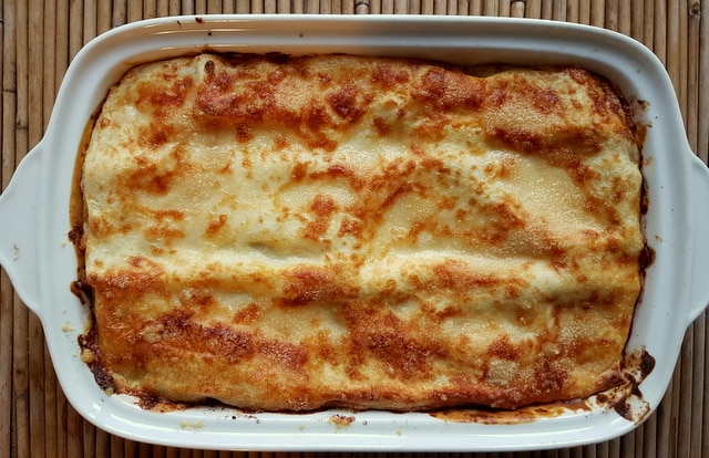 lasagne al forno with bolognese in white oven dish