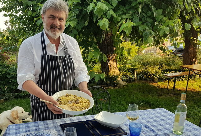 My Sicilian husband Salvatore serving the Linguine pasta alle vongole he cooked