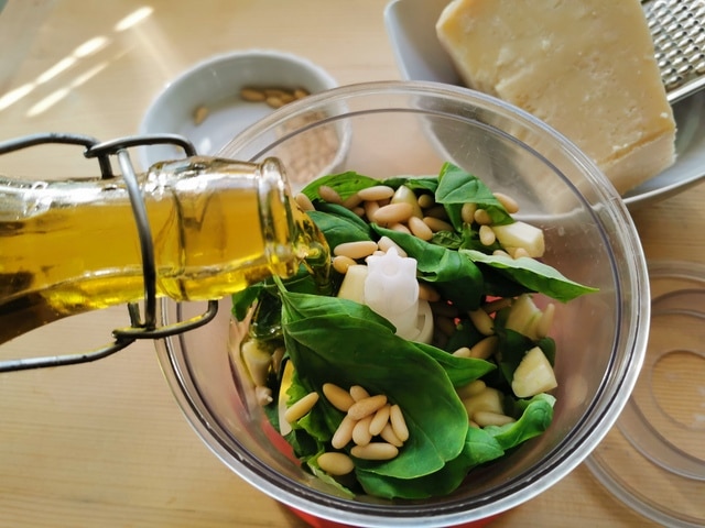 making pesto in a food processor