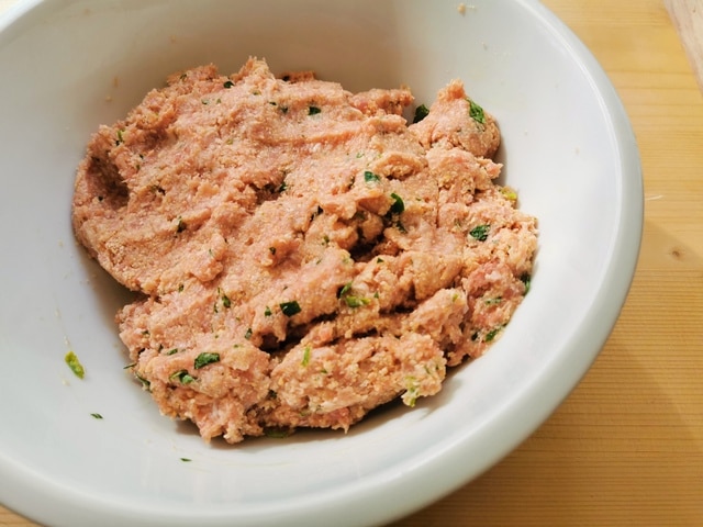 ready meatball mixture in white bowl