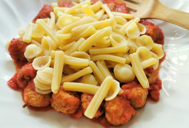 orecchiette maritate added to meatballs and sauce