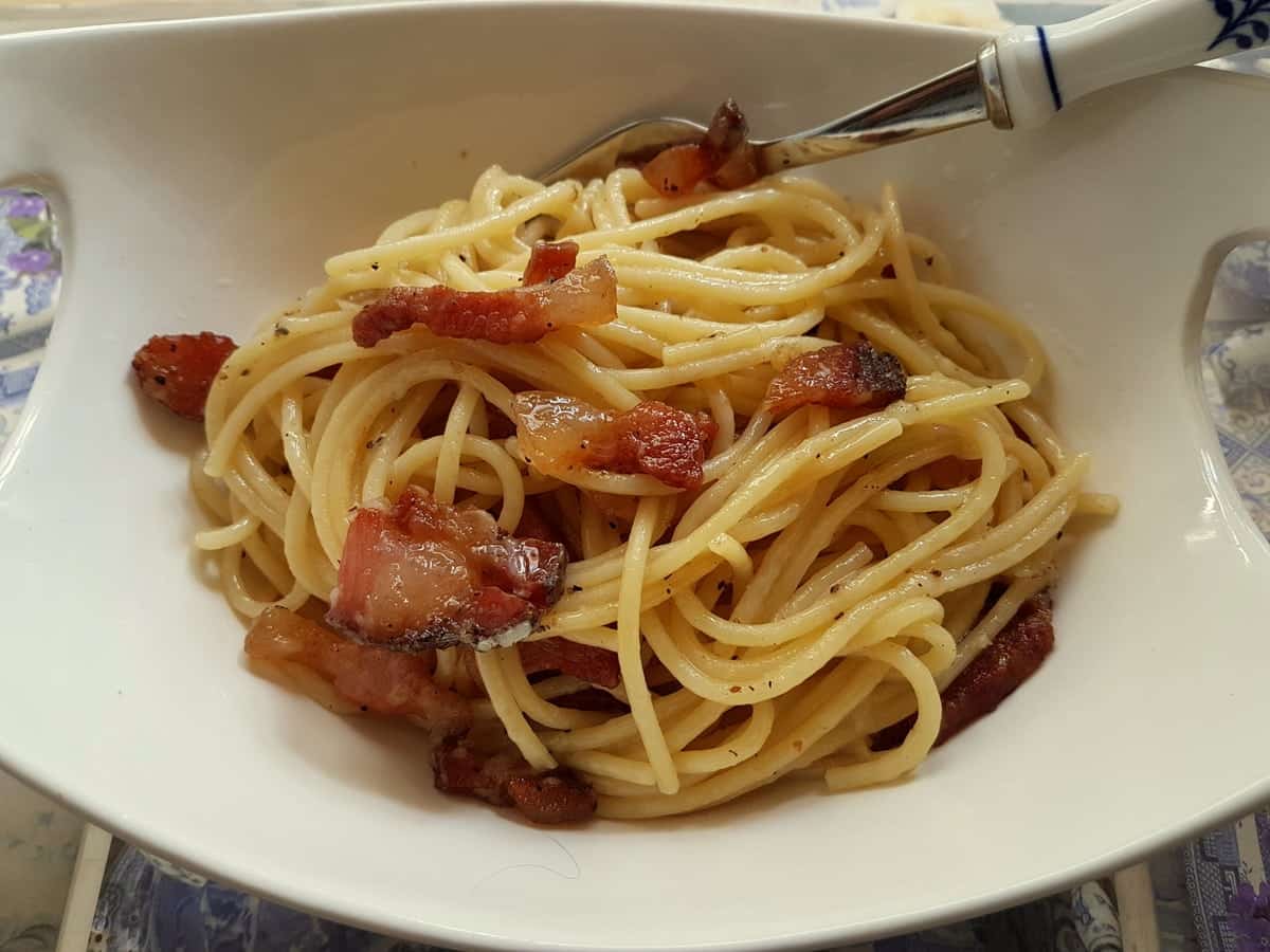 Pasta alla gricia in a white bowl