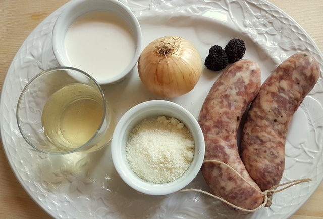 ingredient for pasta alla norcina on white plate