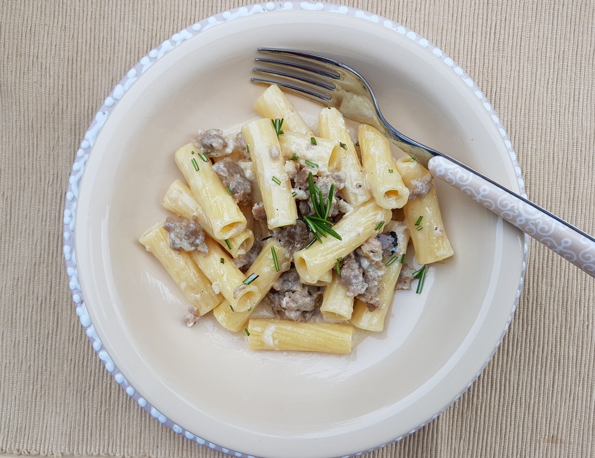 Pasta Norcina in a bowl on a kitchen table.