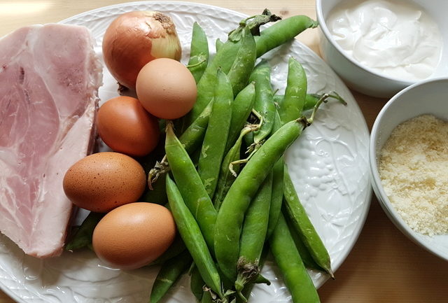 ingredients for pasta alla papalina on white plate