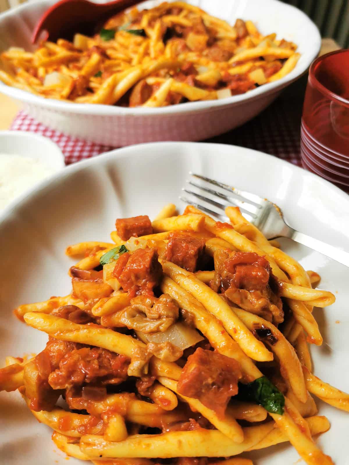 Two bowls of the spicy sausage pasta.