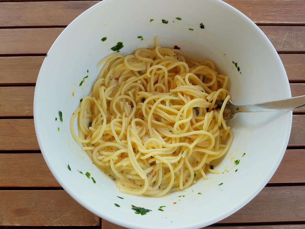 Cooked pasta mixed with beaten eggs.