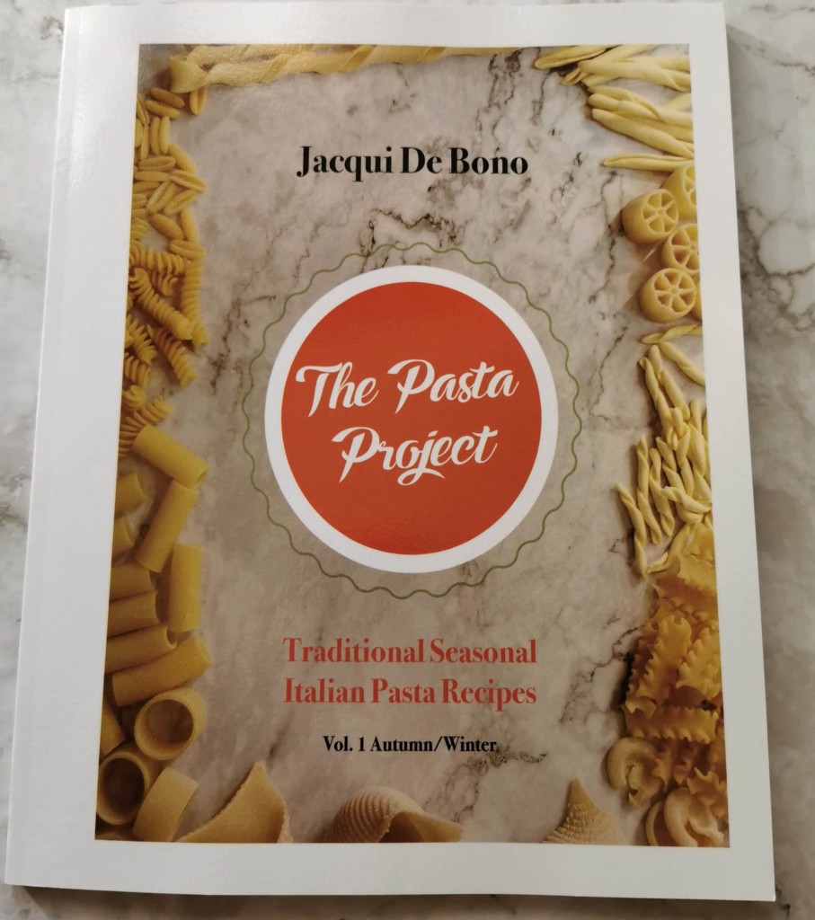 https://www.the-pasta-project.com/wp-content/uploads/pasta-project-cookbook-cover-1-907x1024.jpg