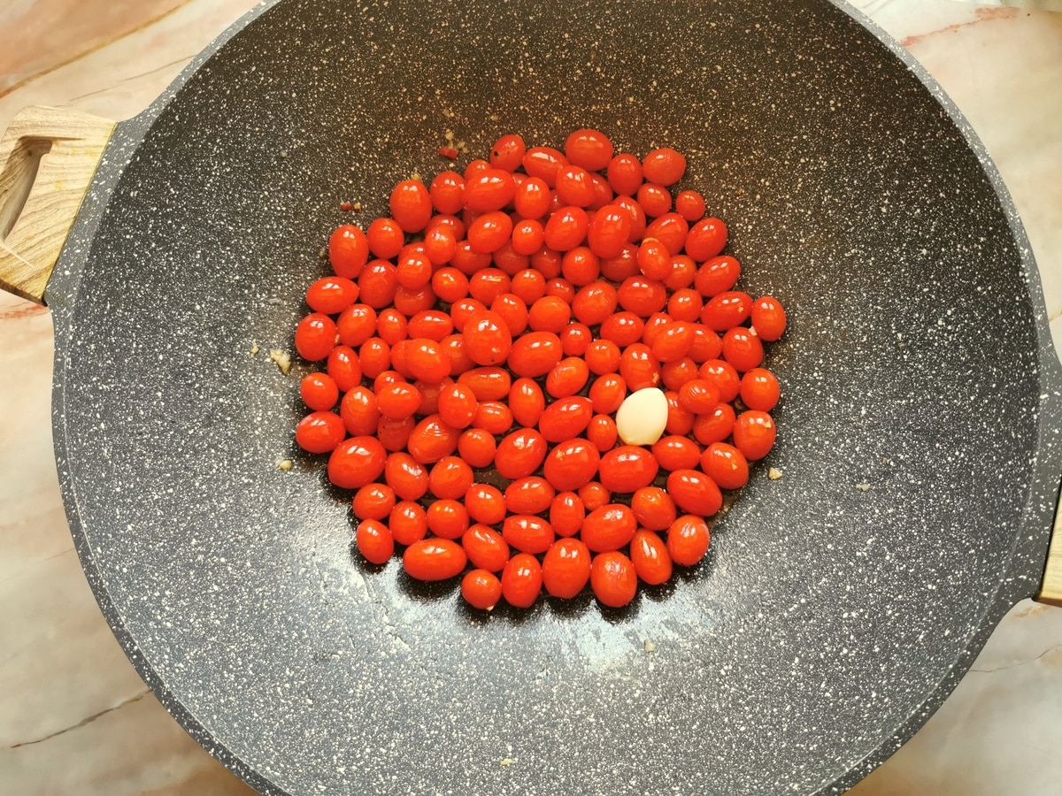 Tomatoes added to the pan