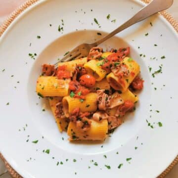 Pasta with Calamari and Tomatoes in a bowl