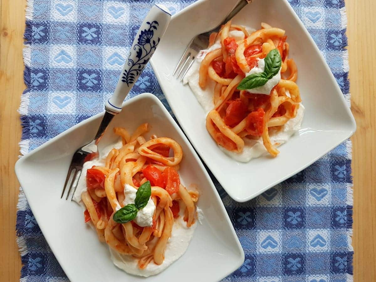 Homemade tomato sauce pasta with ricotta.