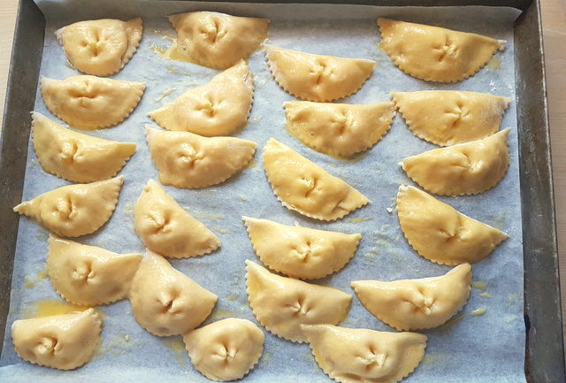 uncooked baked ravioli in oven dish