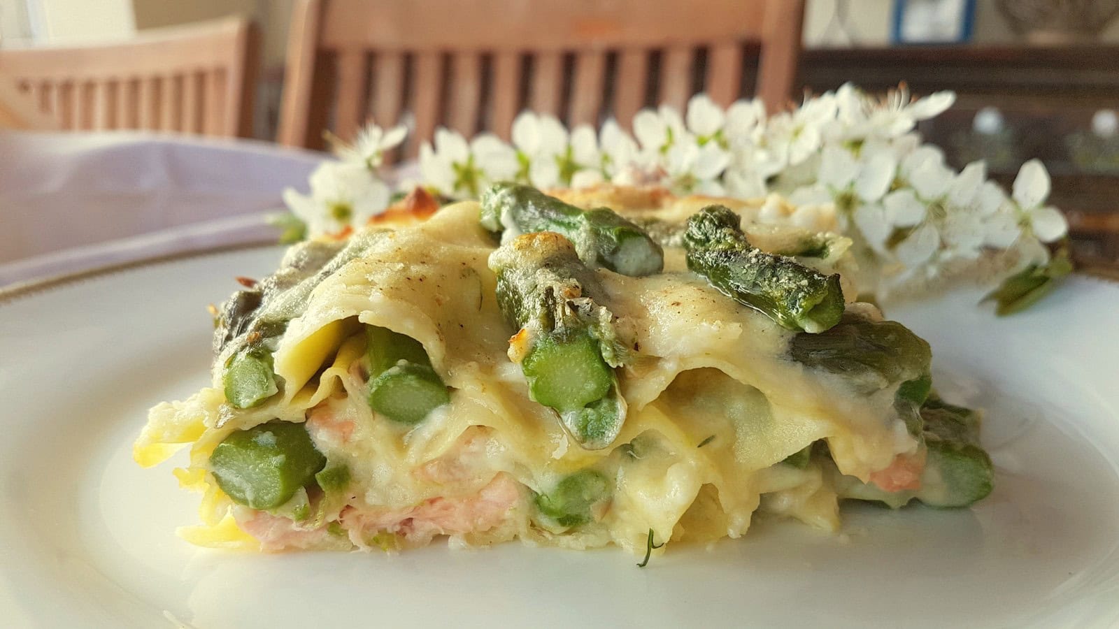 Poached salmon and asparagus lasagne al forno (lasagna).