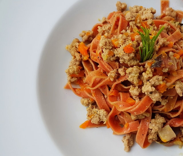 Red wine pasta with white ragu