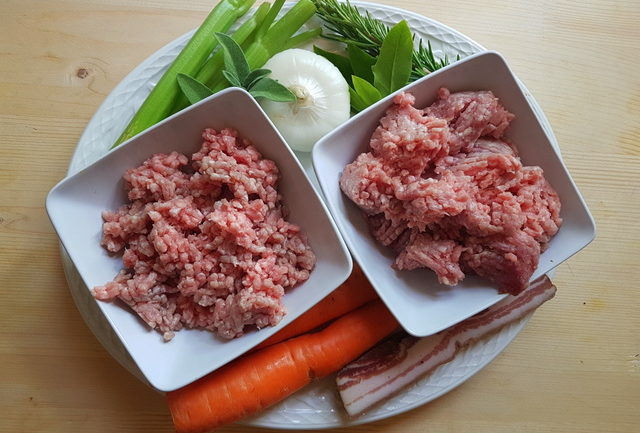 ingredients for white ragu on white plate