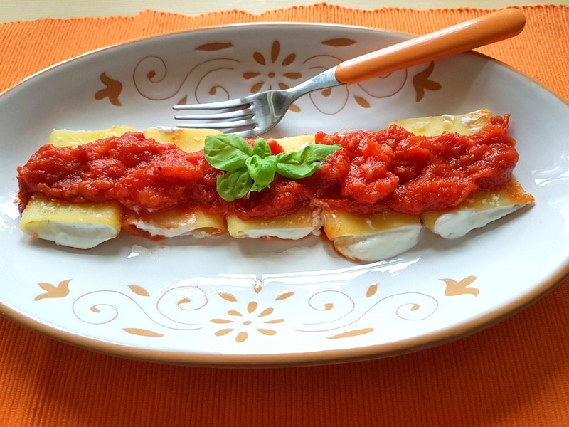 Ricotta and basil filled paccheri pasta.