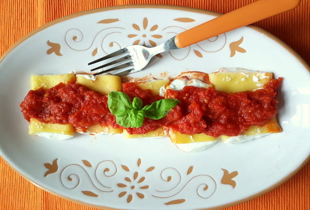 ricotta and basil filled paccheri pasta with homemade tomato sauce