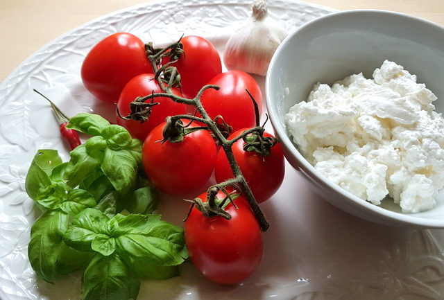 ingredients for ricotta and basil filled paccheri pasta with homemade tomato sauce