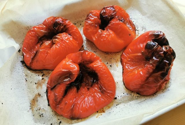 4 ready roasted red peppers on baking tray