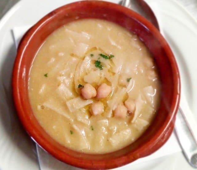 sagne pasta with chickpeas without tomatoes in terracotta bowl