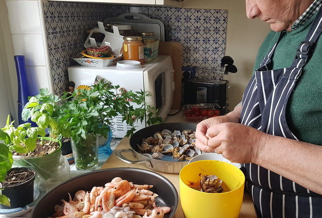 my Sicilian hubby preparing the seafood