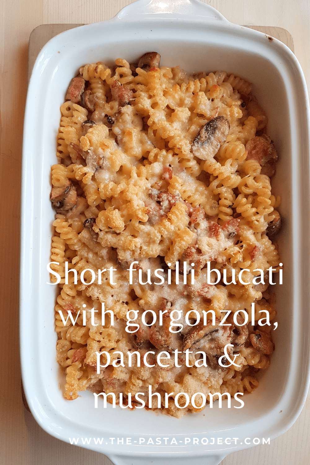 baked short fusilli bucati with gorgonzola, pancetta and mushrooms