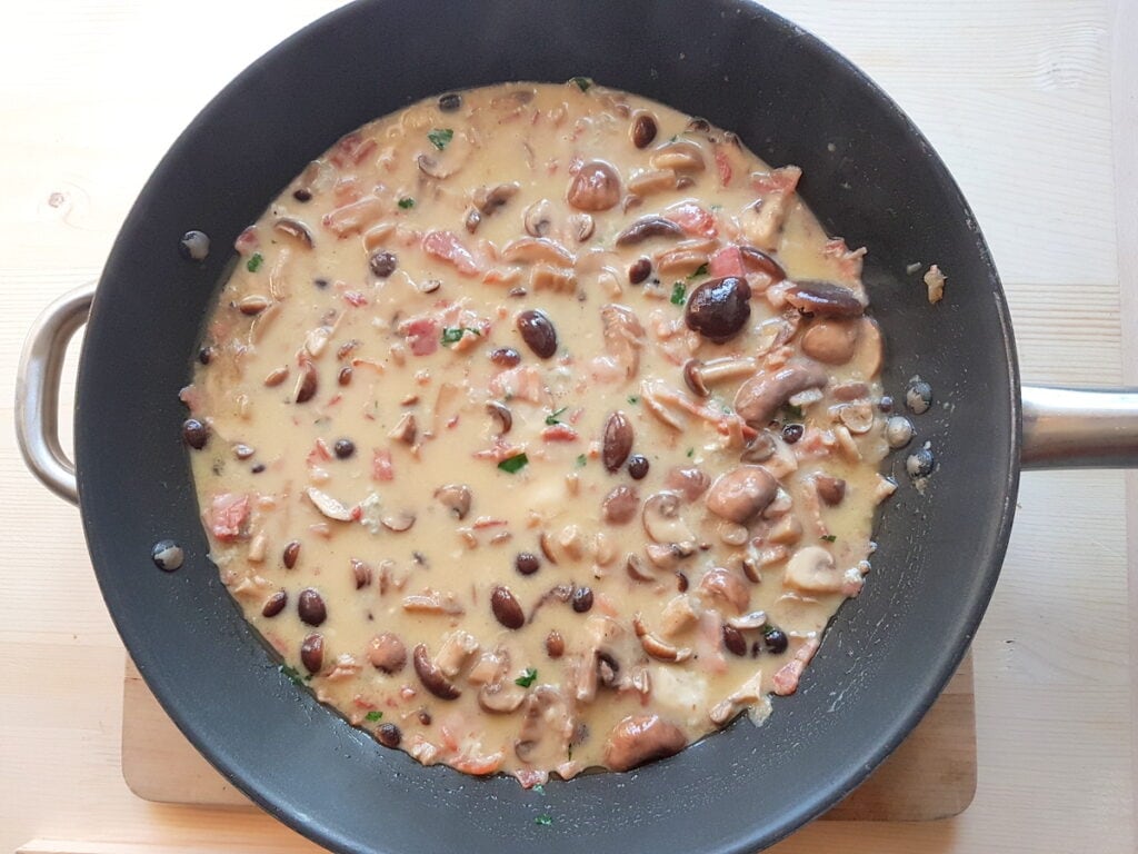 gorgonzola, pancetta and mushroom pasta sauce in skillet.