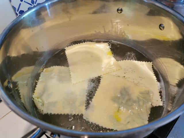 fresh fazzoletti di seta cooking in boiling water